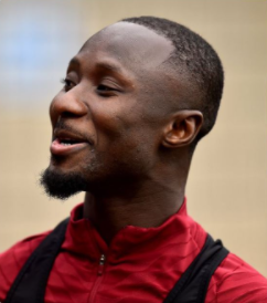 Keita smiles to train with another of Liverpool